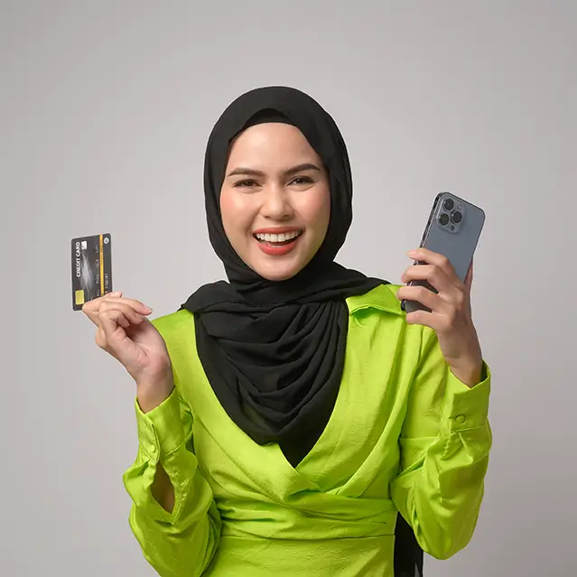 vecteezy_musllim-woman-holding-credit-card-and-smartphone-over-white_49751343